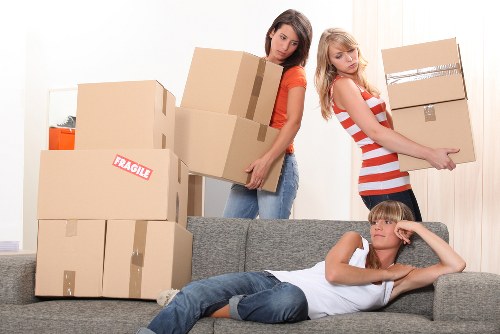 Removal team handling belongings during a Catford move